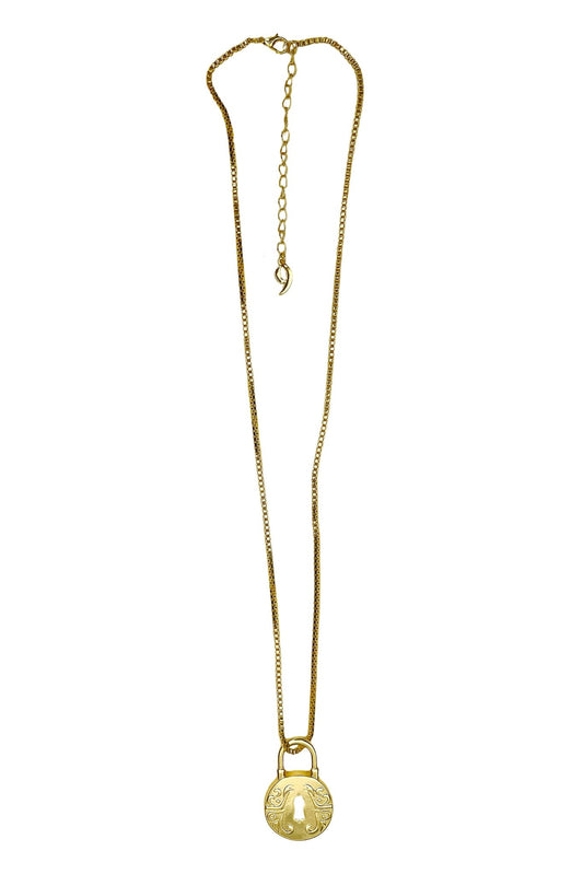 a gold necklace with a pendant on a white background