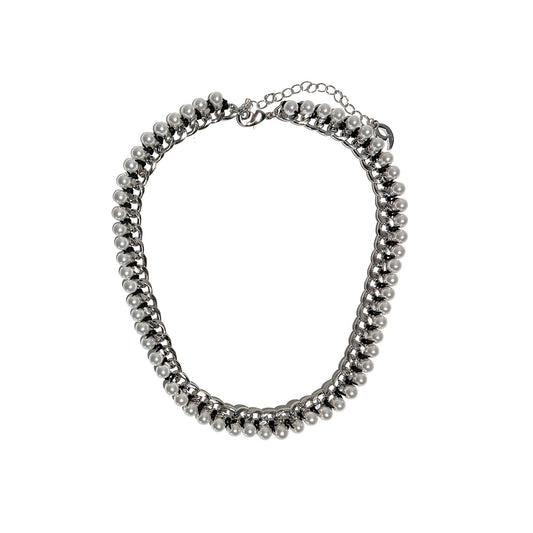 a silver beaded bracelet on a white background